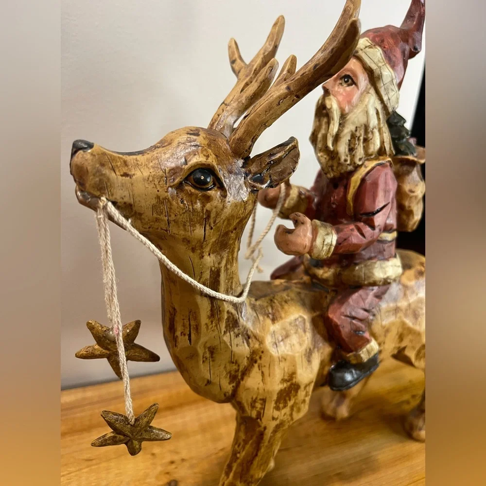 Primitive Folk Art Santa riding Reindeer 12”‎ tall chiseled resin faux wood